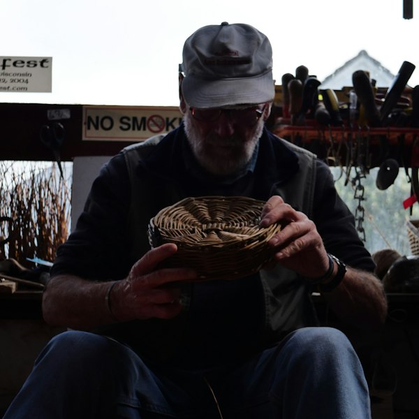 Hand-weaving a basket, representing Beatroots' craft techniques